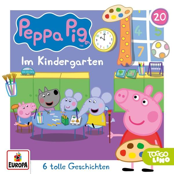 Peppa Wutz Buchcover auf Deutsch. Peppa Wutz und Freunde sitzen an einem Tisch. Text: Im Kindergarten.