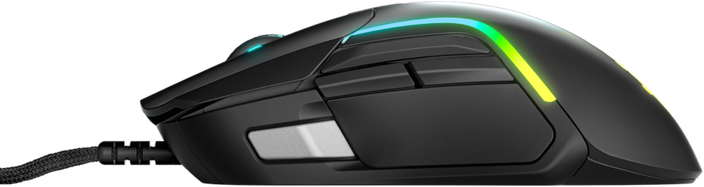 Vue latérale d'une souris gaming noire avec bords illuminés sur surface blanche.