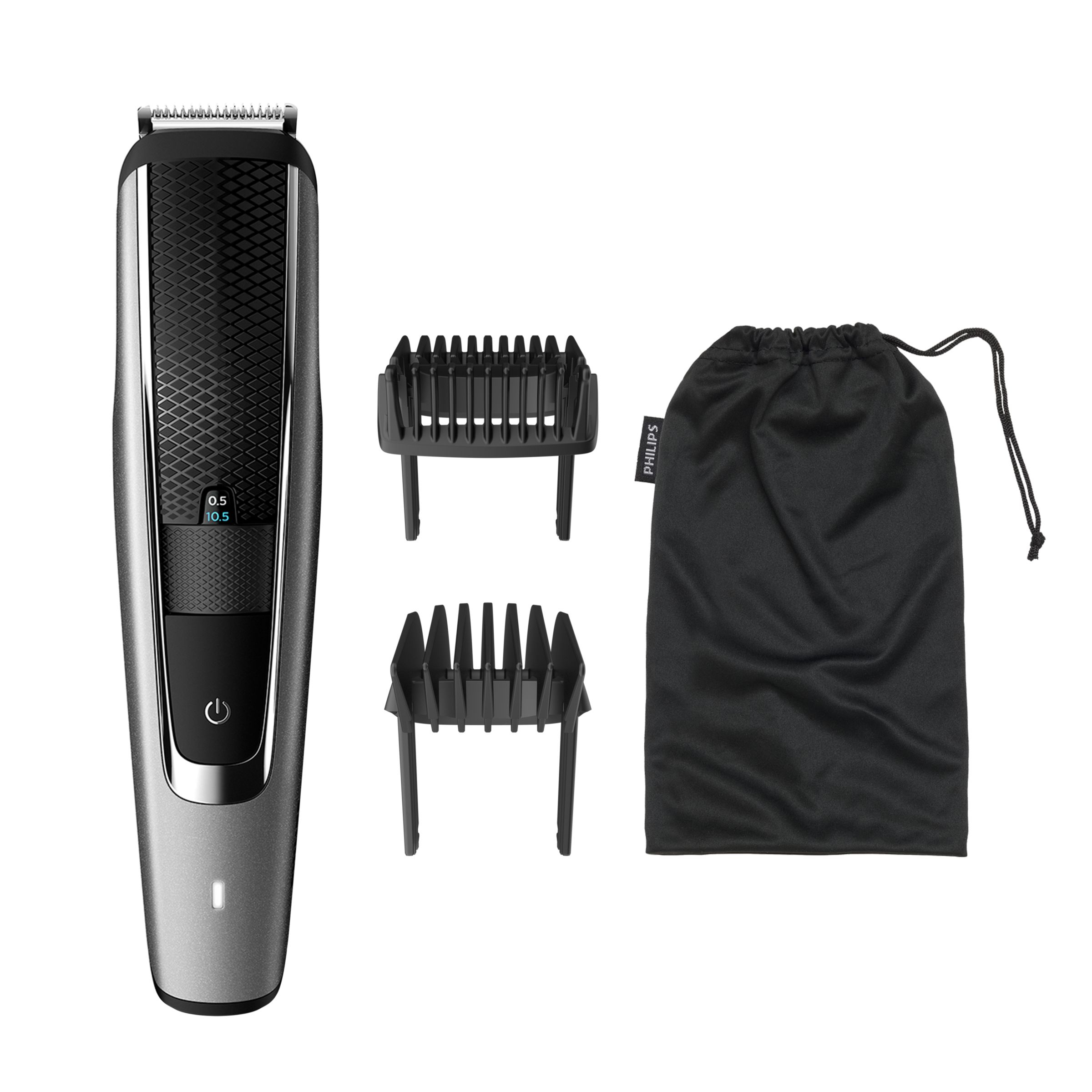 Een Philips baardtrimmer, twee opzetkammen en een zwarte opbergzak op een witte ondergrond.
