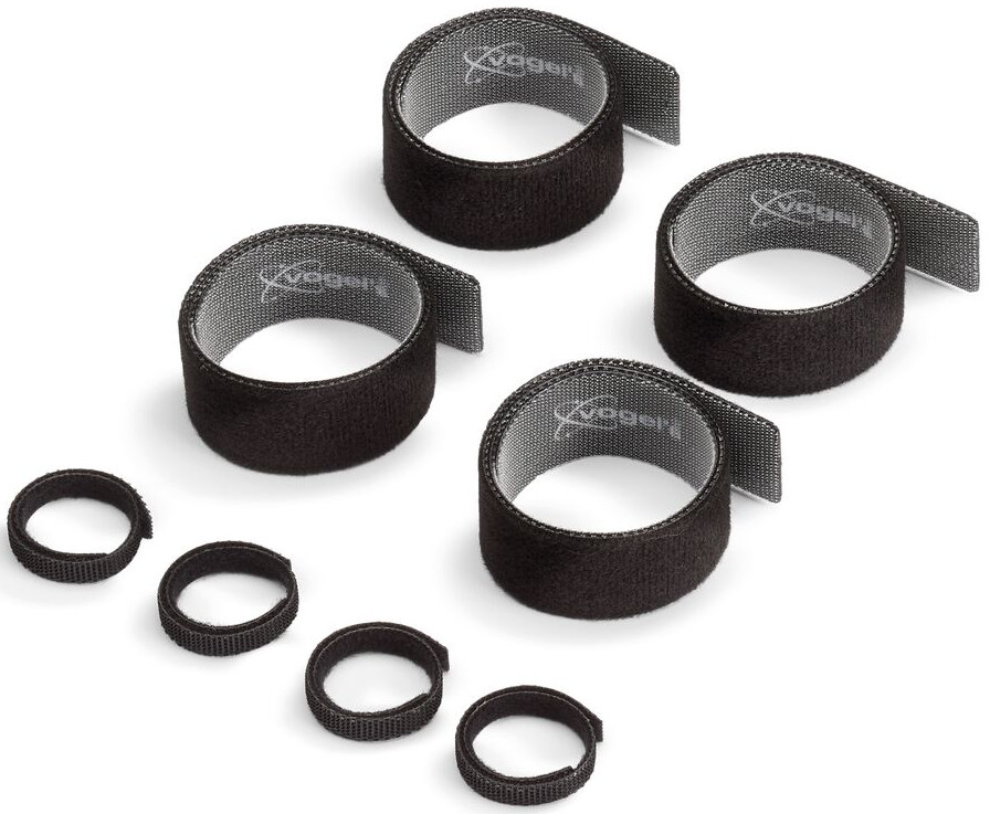 Set zwarte klittenbandriemen, vier grote en drie kleine.
