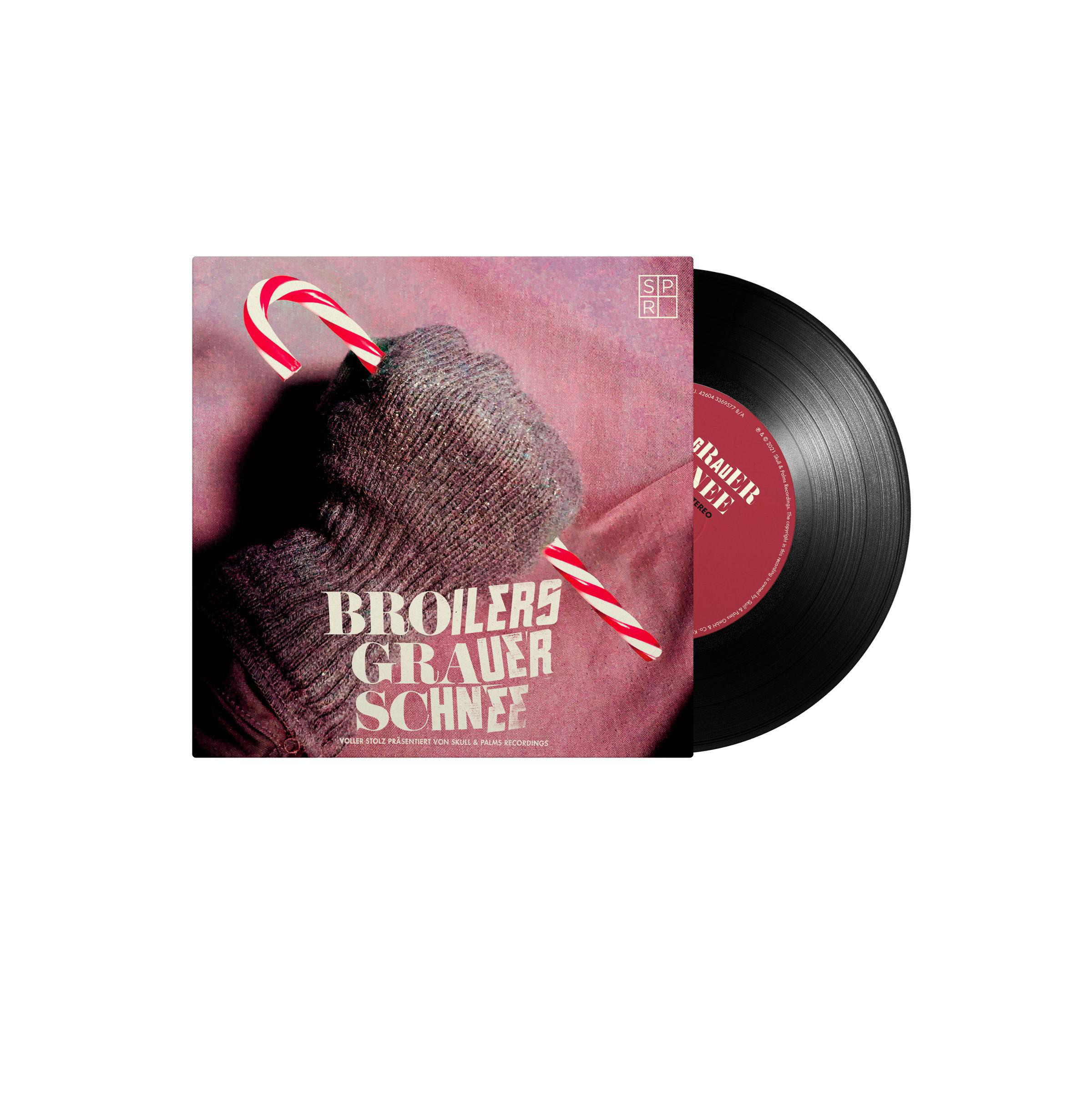 Albumcover mit einer Hand, die eine Zuckerstange hält, und einer daneben liegenden Schallplatte. Die Platte ist schwarz.