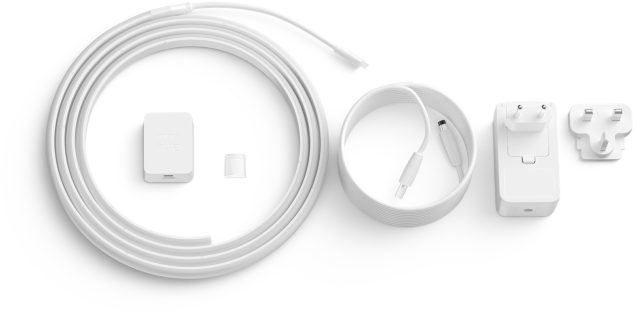 White electronic accessories, including a light strip, charger, and power adapter.