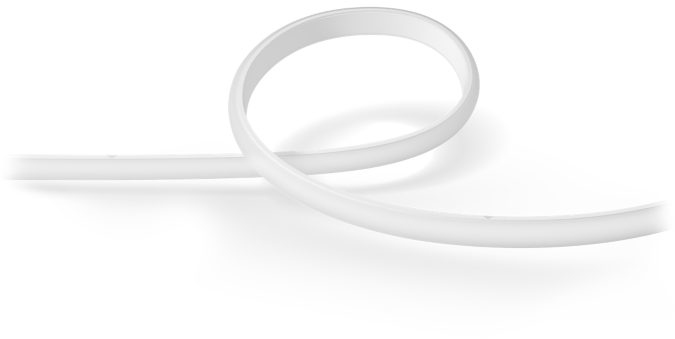 A white, curved LED strip, coiled on a white surface, casting a shadow.