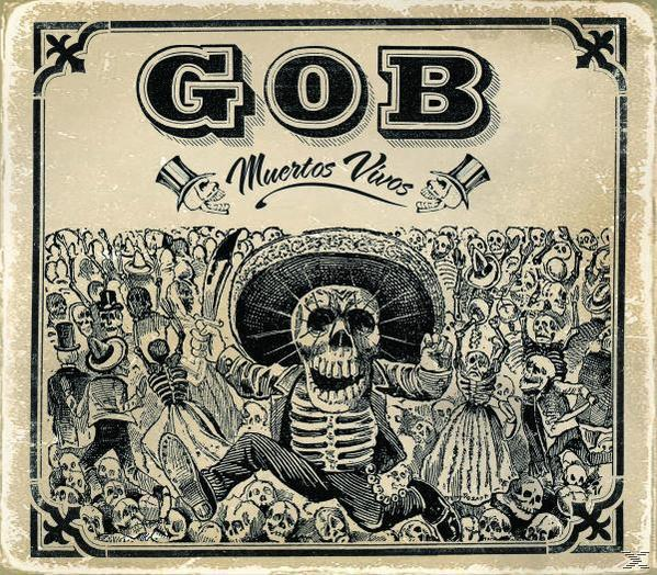 GOB album borító: Kalapos csontváz, csontvázakkal körülvéve, temető stílusú jelenetben.