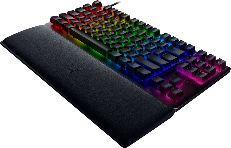 Eine schwarze Tastatur mit bunten, hintergrundbeleuchteten Tasten und einer Handgelenkauflage.