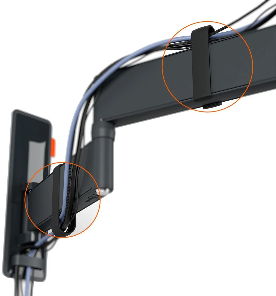 Een close-up van kabels die worden vastgehouden door zwarte clips op een metalen structuur.