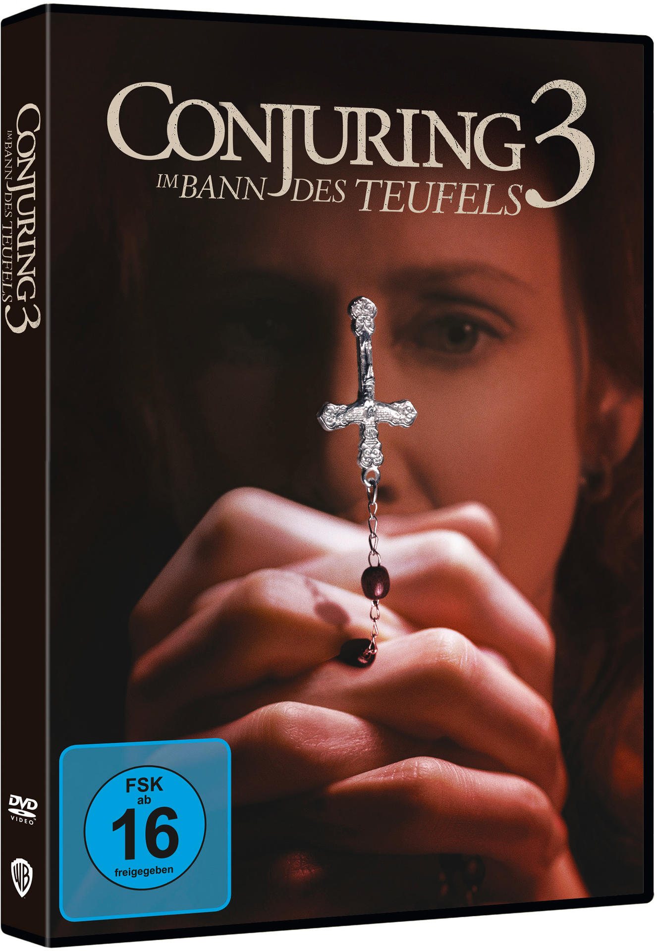 DVD-Hülle für 'Conjuring 3' mit dem Gesicht einer Frau und einem Kreuz.
