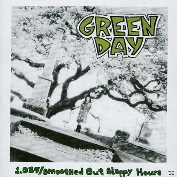 Album borító a Green Day felirattal. A kép egy temetőt mutat, egy nővel az előtérben.