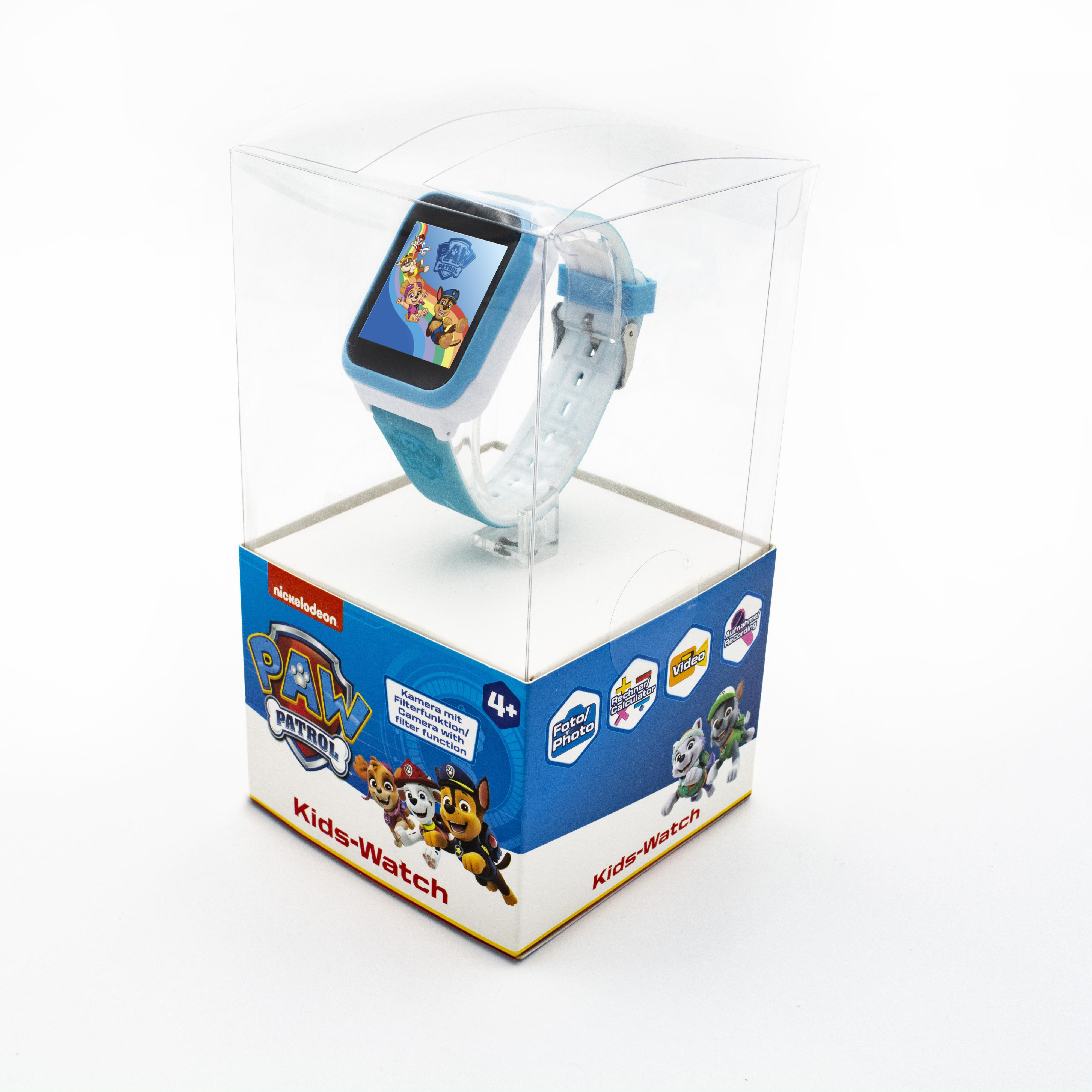 Eine Spielzeuguhr für Kinder in einer transparenten Box, auf einer Box mit Paw Patrol-Branding.