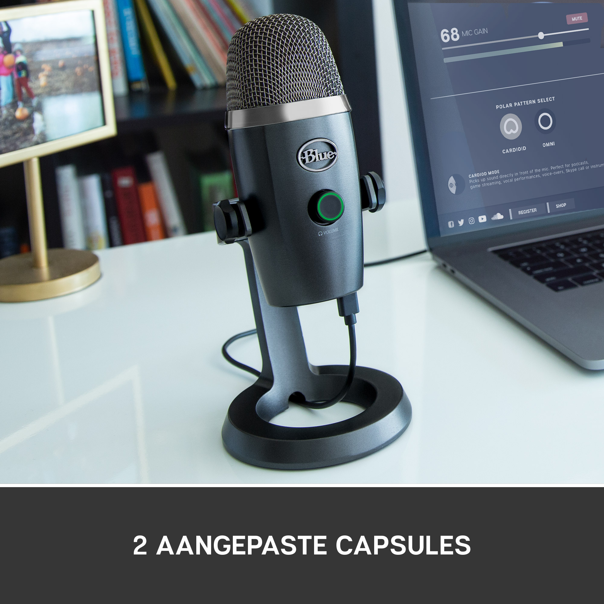 A blue microphone on a stand with a laptop in the background. The laptop shows options.