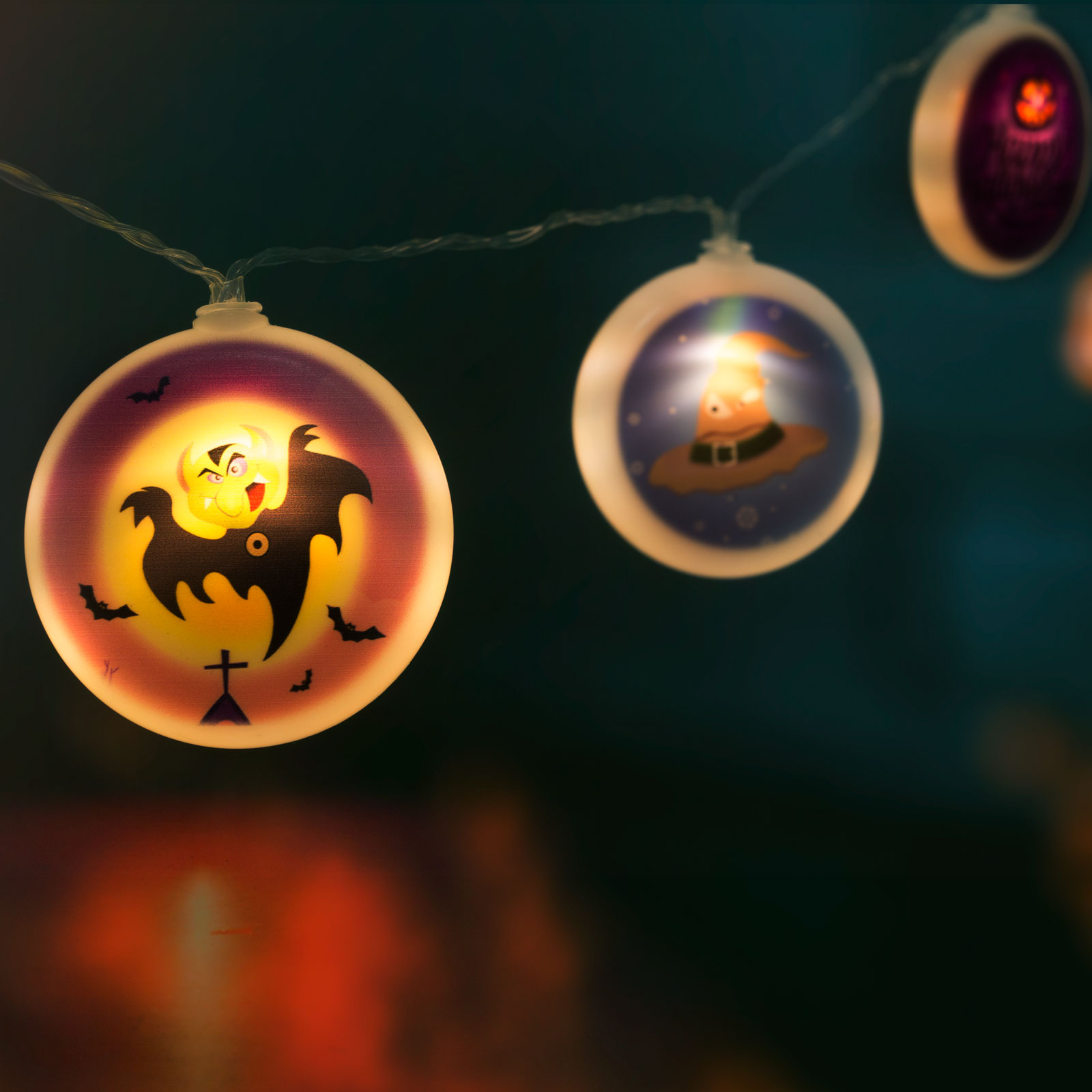 FAMILY HALLOWEEN 56522 Halloween-i LED-es fényfüzér korongok - 10 LED 2 x AA 1,35 m