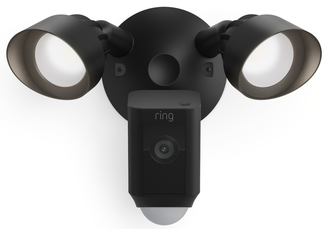 Een zwarte Ring-schijnwerpercamera die aan een muur is bevestigd, van bovenaf gezien.