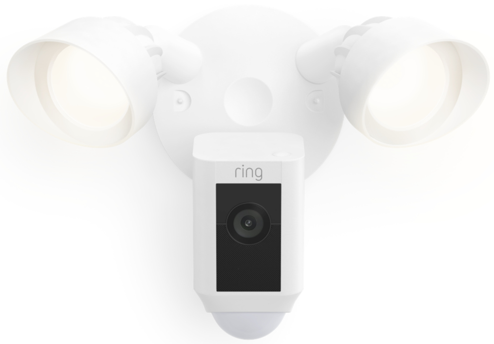 White Ring security camera with two lights. It is mounted on a white wall.