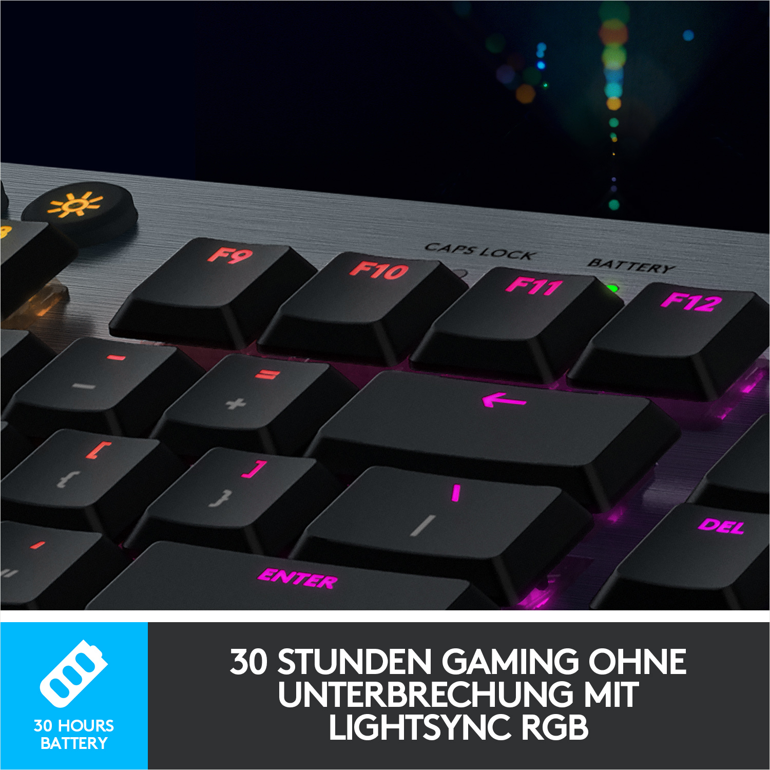 Nahaufnahme einer Tastatur mit beleuchteten Tasten und dem Text '30 HOURS BATTERY'.