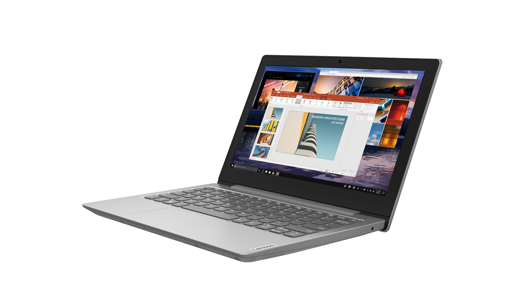 Ein silberner Laptop ist geöffnet und zeigt eine Präsentation über moderne Architektur. Der Bildschirm ist an.