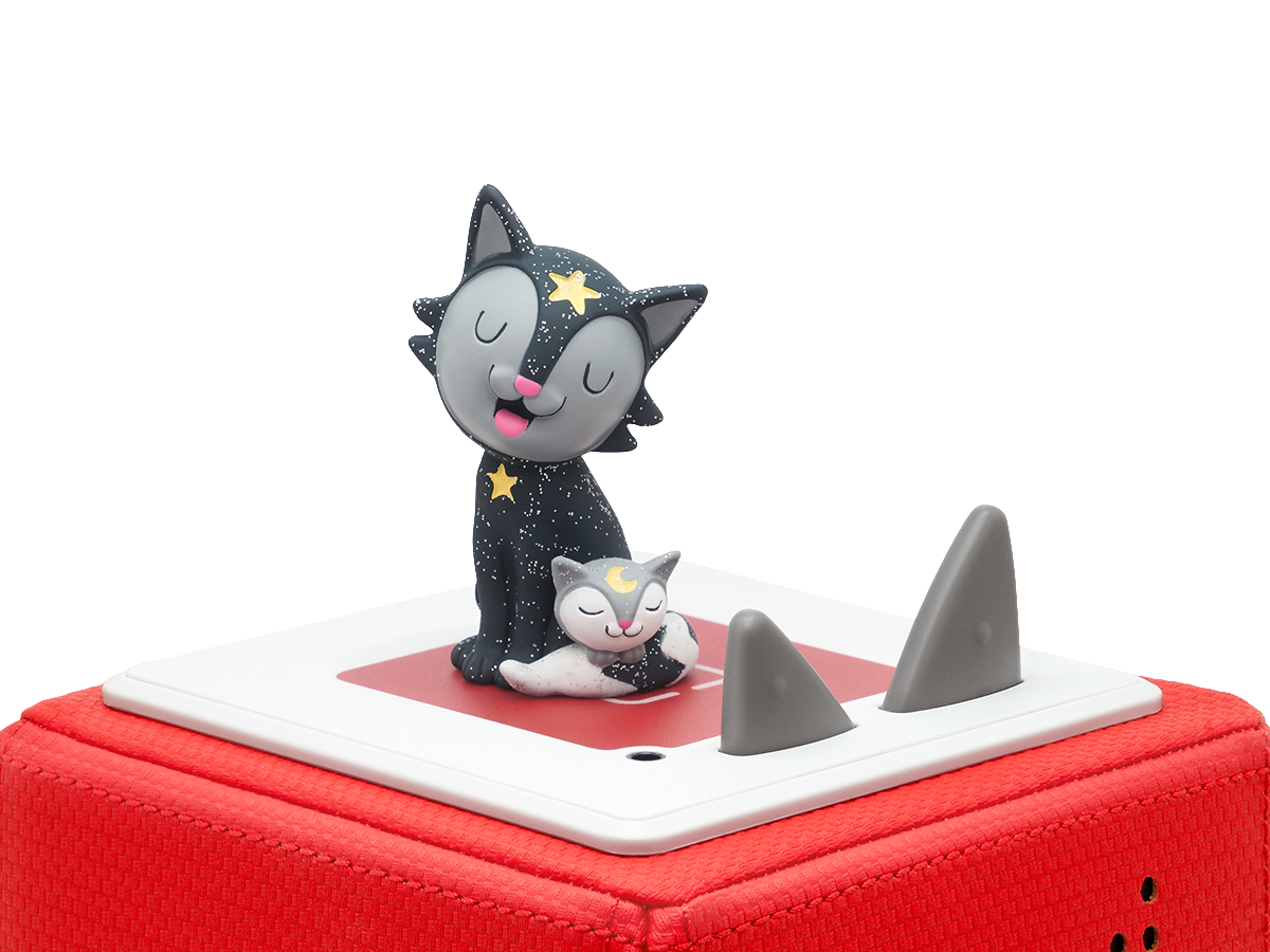 Ein roter Würfel mit zwei Cartoon-Katzenfiguren, eine sitzend, eine schlafend.