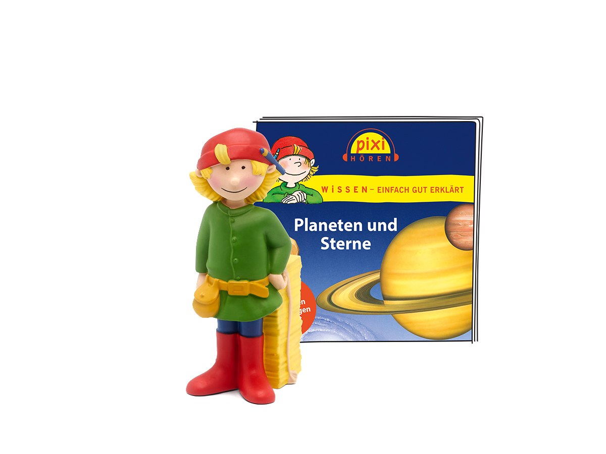 Buch und Spielzeug. Eine Jungenfigur hält das Buch über Planeten und Sterne.