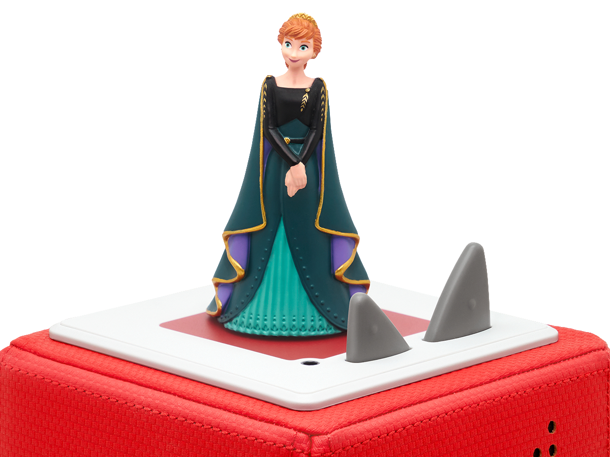 Anna-Puppe aus Frozen auf roter Basis mit Haiflossen, weißer Hintergrund. Es ist ein Spielzeug.