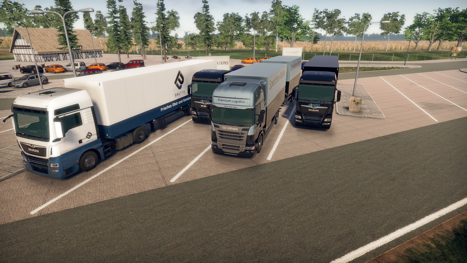 Diversi camion parcheggiati in un parcheggio. I loghi di diverse aziende sono sui rimorchi dei camion.