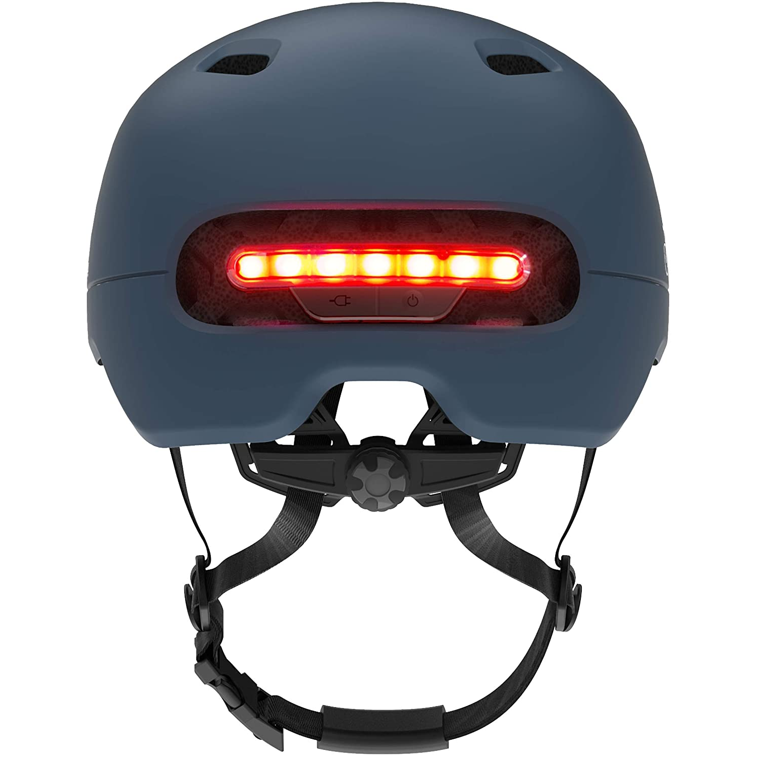 Un casco de bicicleta azul con una luz roja en la parte trasera. El casco tiene una correa y un dial.