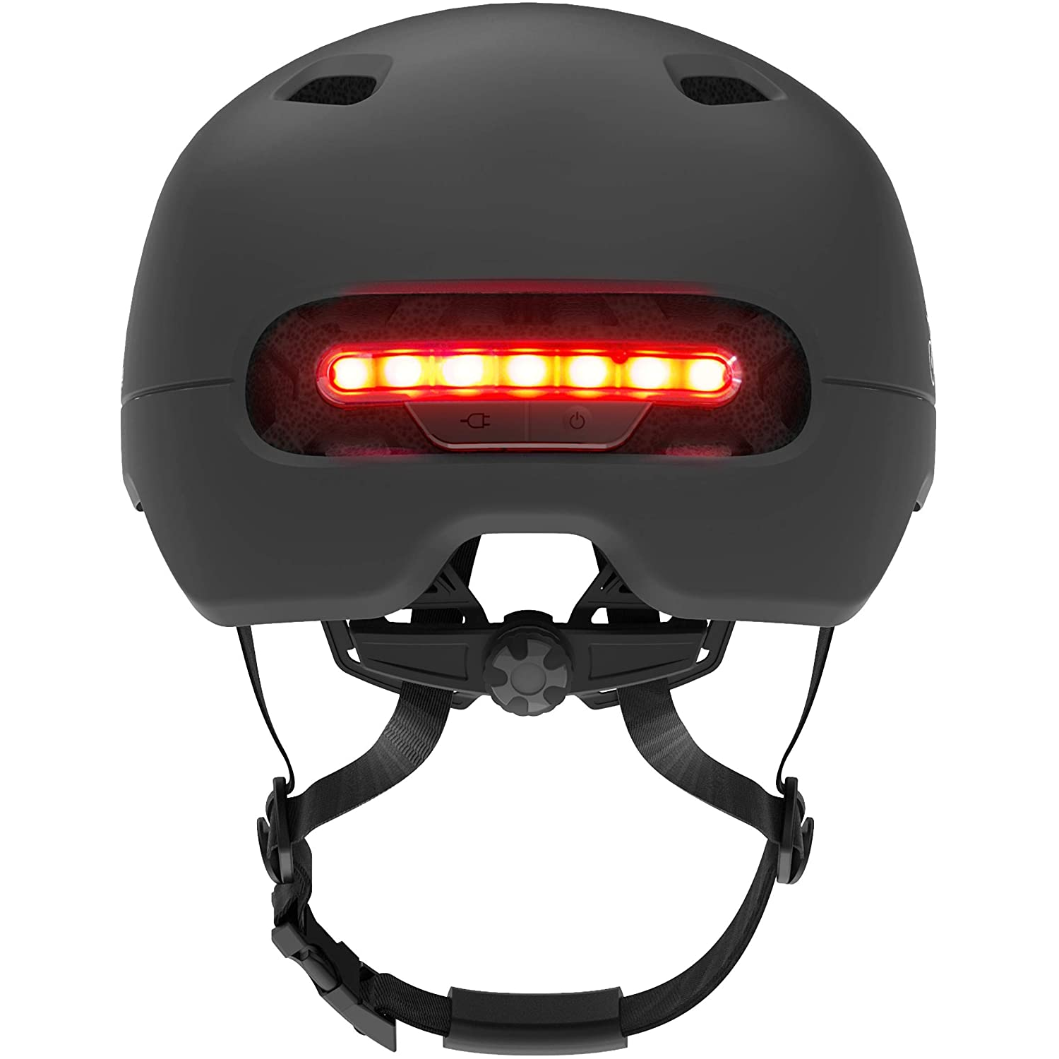 Un casco de bicicleta negro con una barra de luz LED roja en la parte trasera y correas.