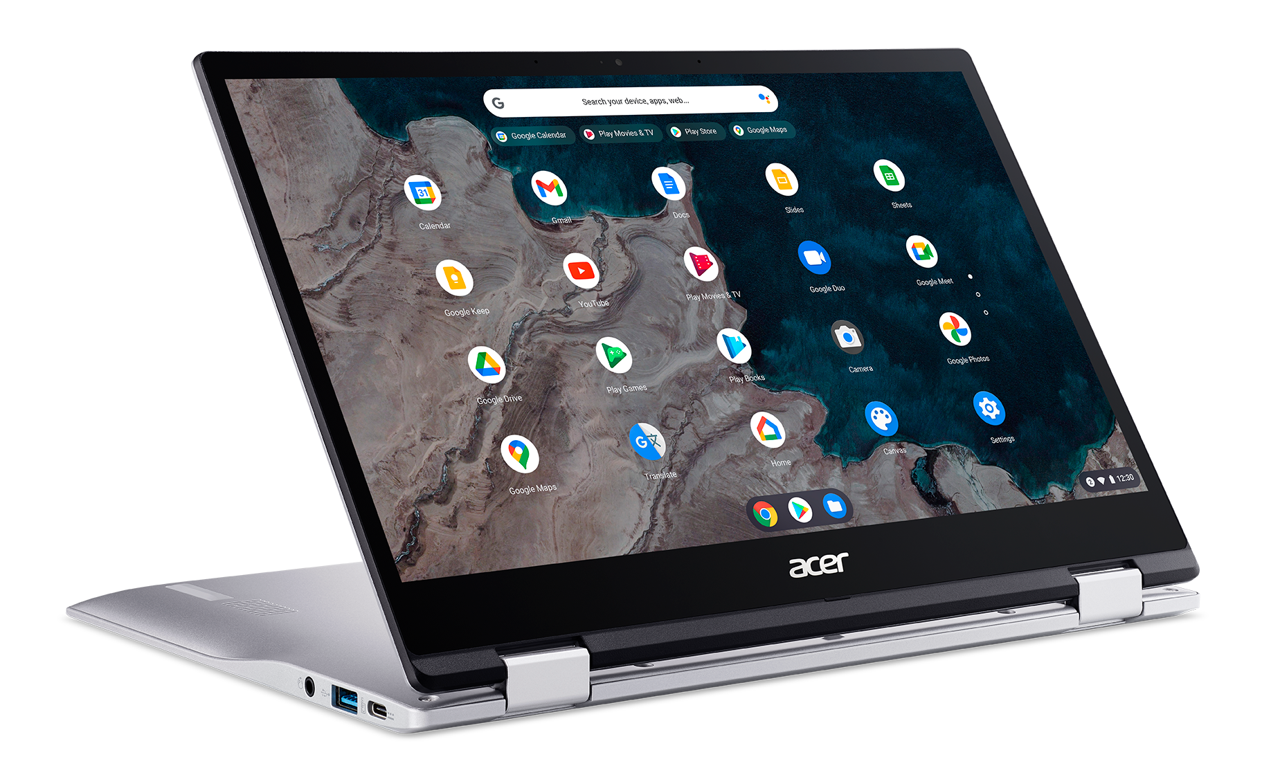 Zilveren Acer Chromebook laptop open, toont app-iconen op het scherm.