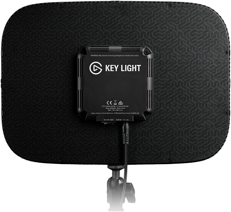 Fekete LED-es fény panel a 'Key Light' felirattal és egy tápkábellel, fekete háttéren.