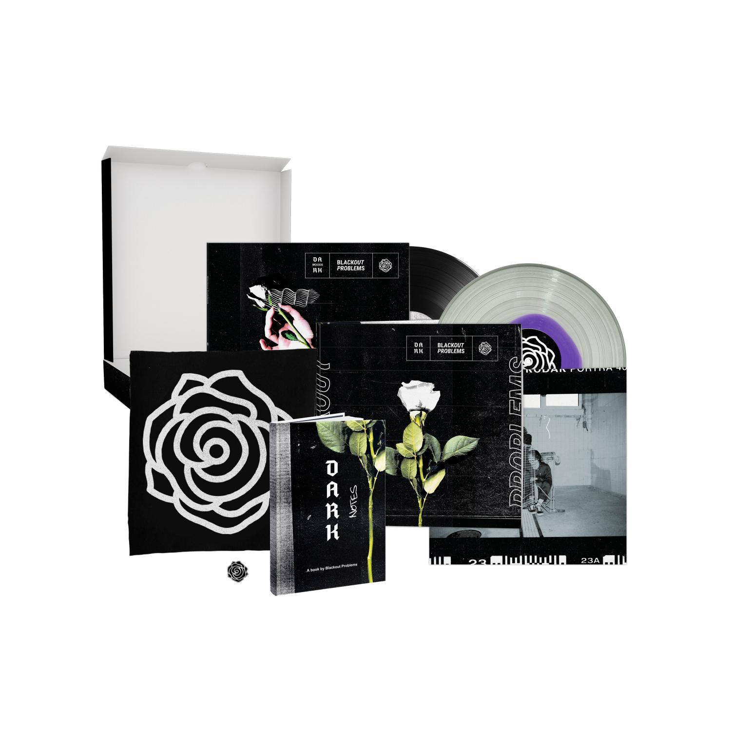 Ein Box-Set mit Vinyl-Schallplatten, einem Buch und Rosengrafiken.