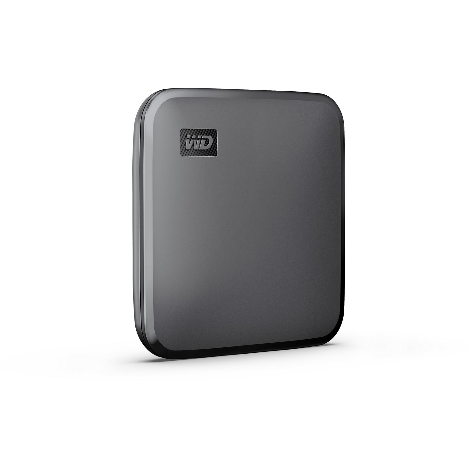 Un disco duro externo gris oscuro, marca WD, sobre una superficie blanca.