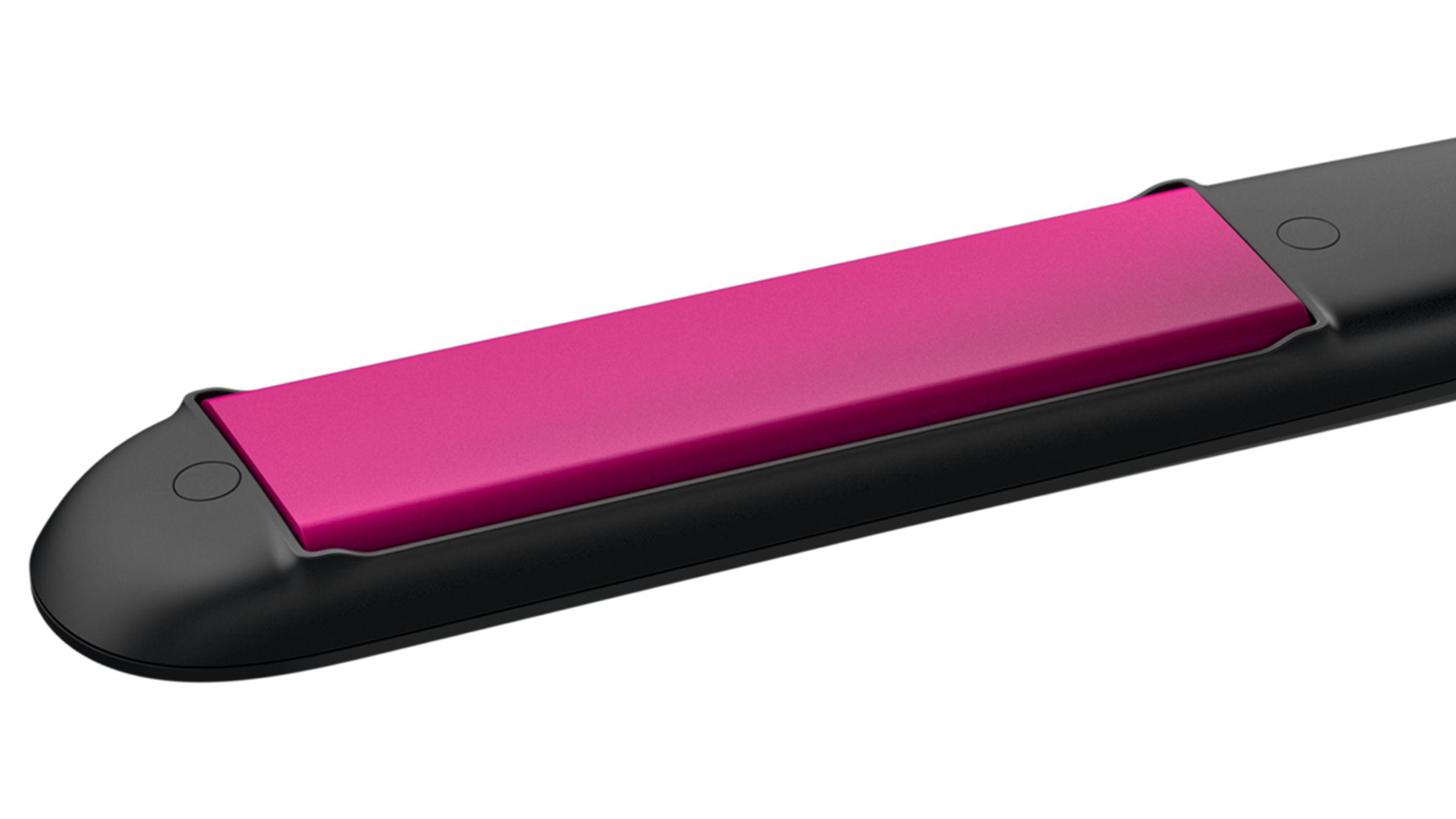 Primer plano de una plancha de pelo negra con placa rosa.