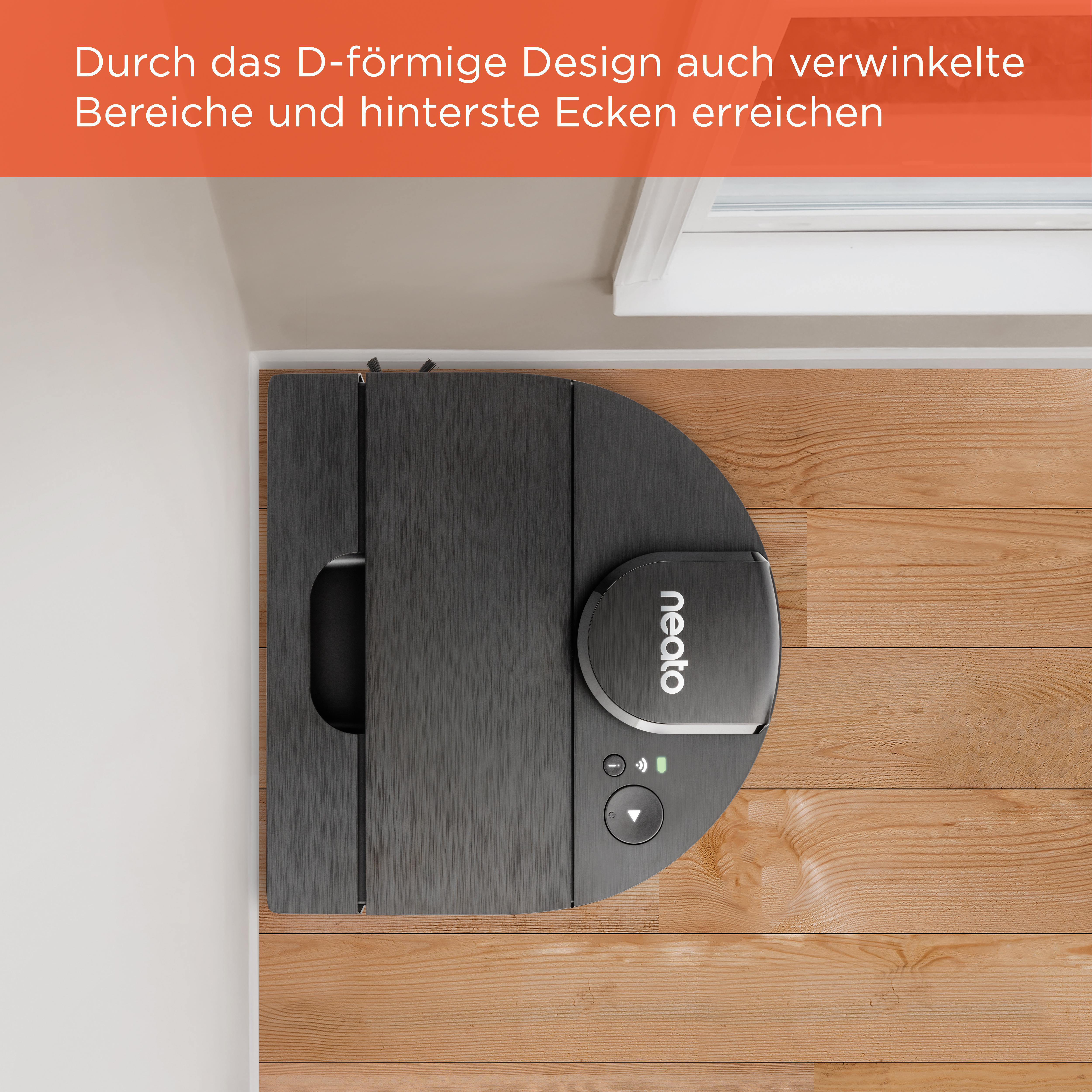 Ein schwarzer Roboter-Staubsauger auf einem Holzboden in der Nähe einer Wand. Der Text ist auf Deutsch.