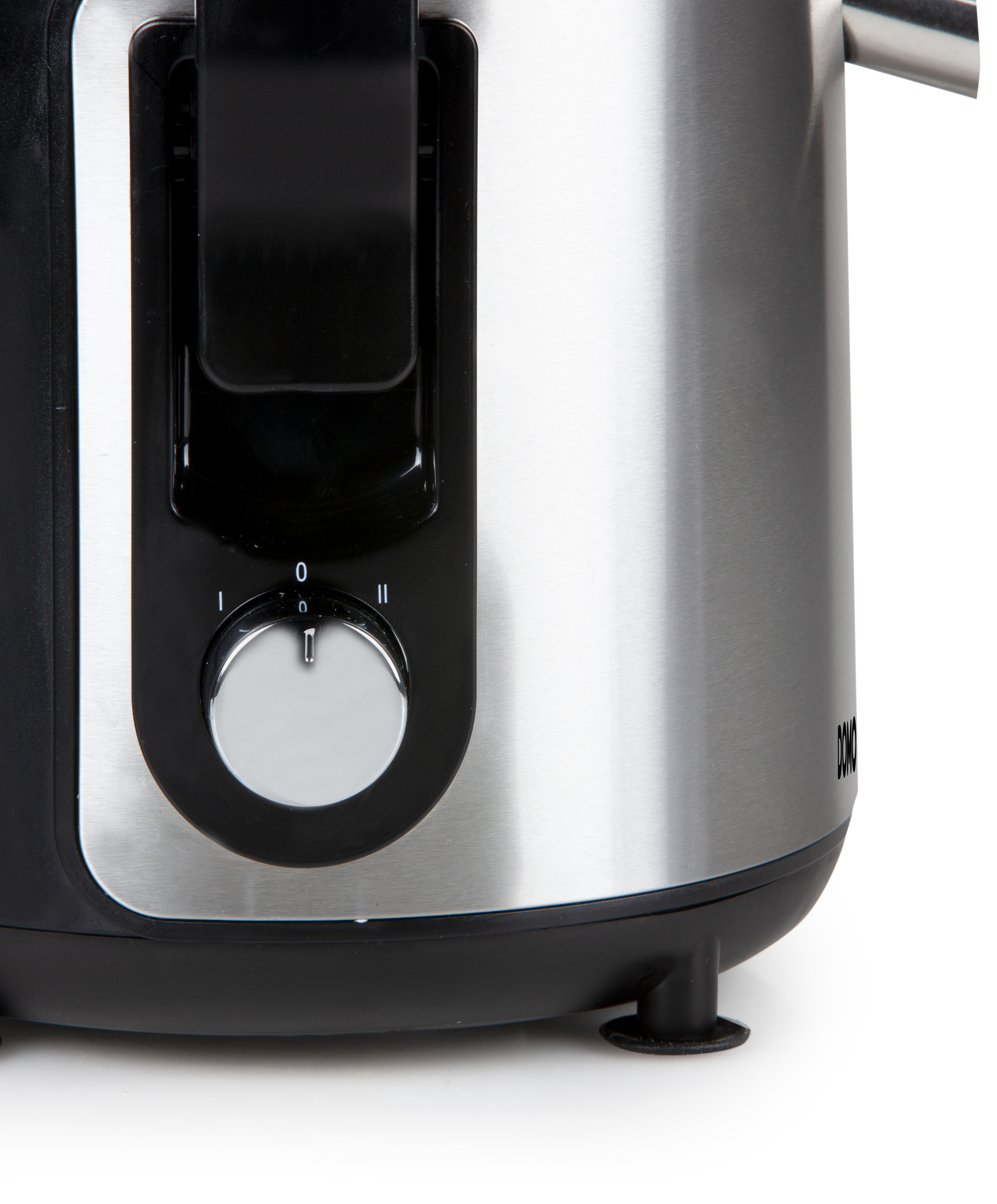 A close-up of a black and silver kitchen appliance with a dial and a black base.