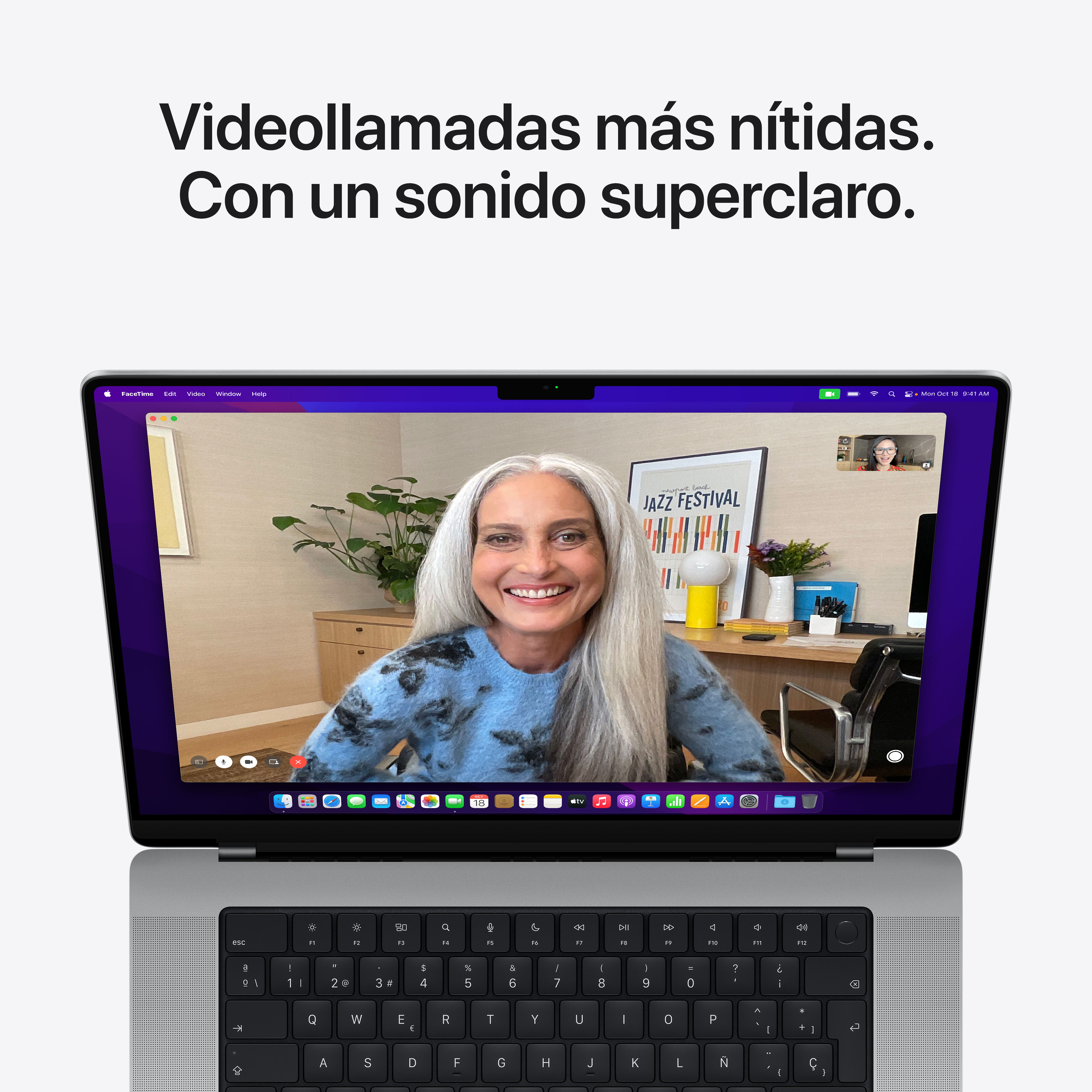 Un portátil con una videollamada en la pantalla, con una mujer sonriendo.