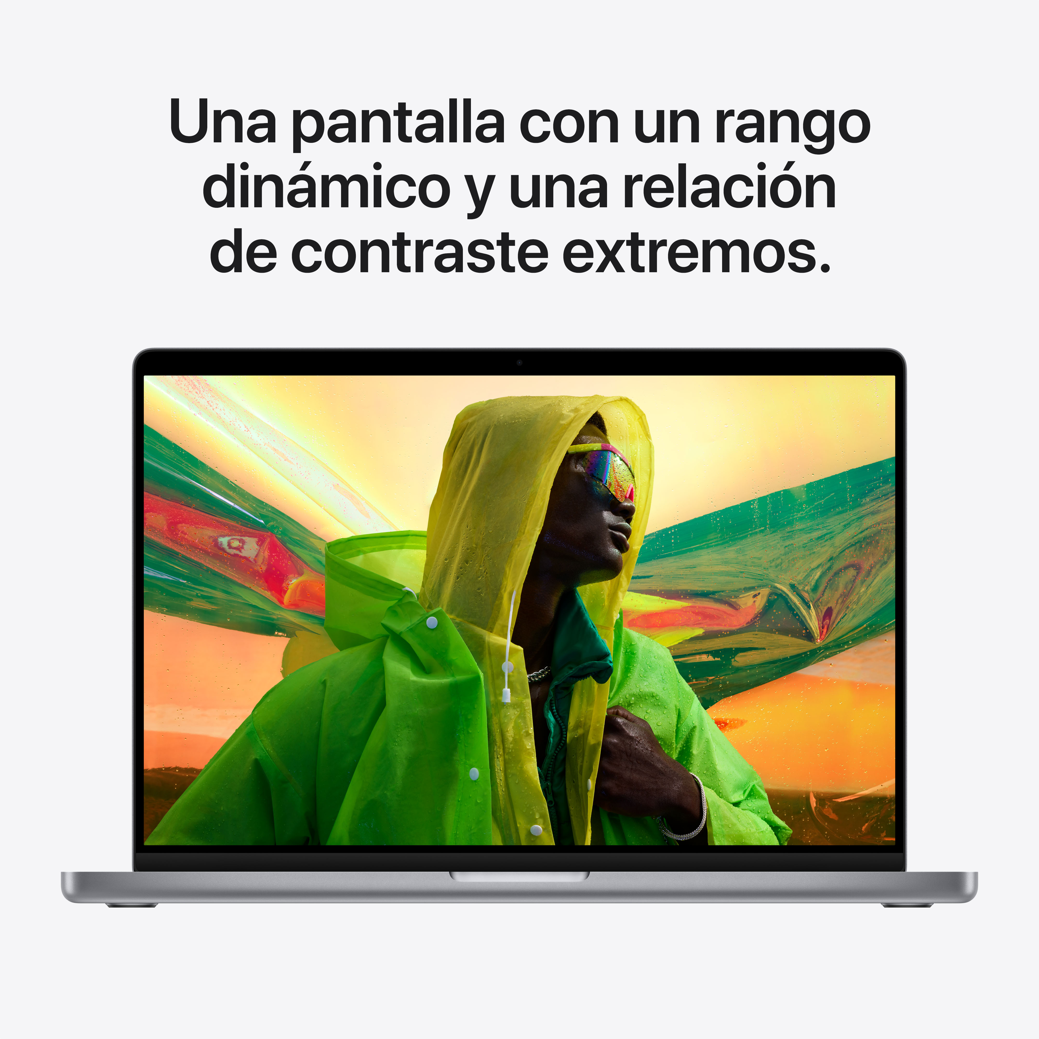 Pantalla de portátil con imagen colorida de persona con abrigo amarillo y gafas de sol.