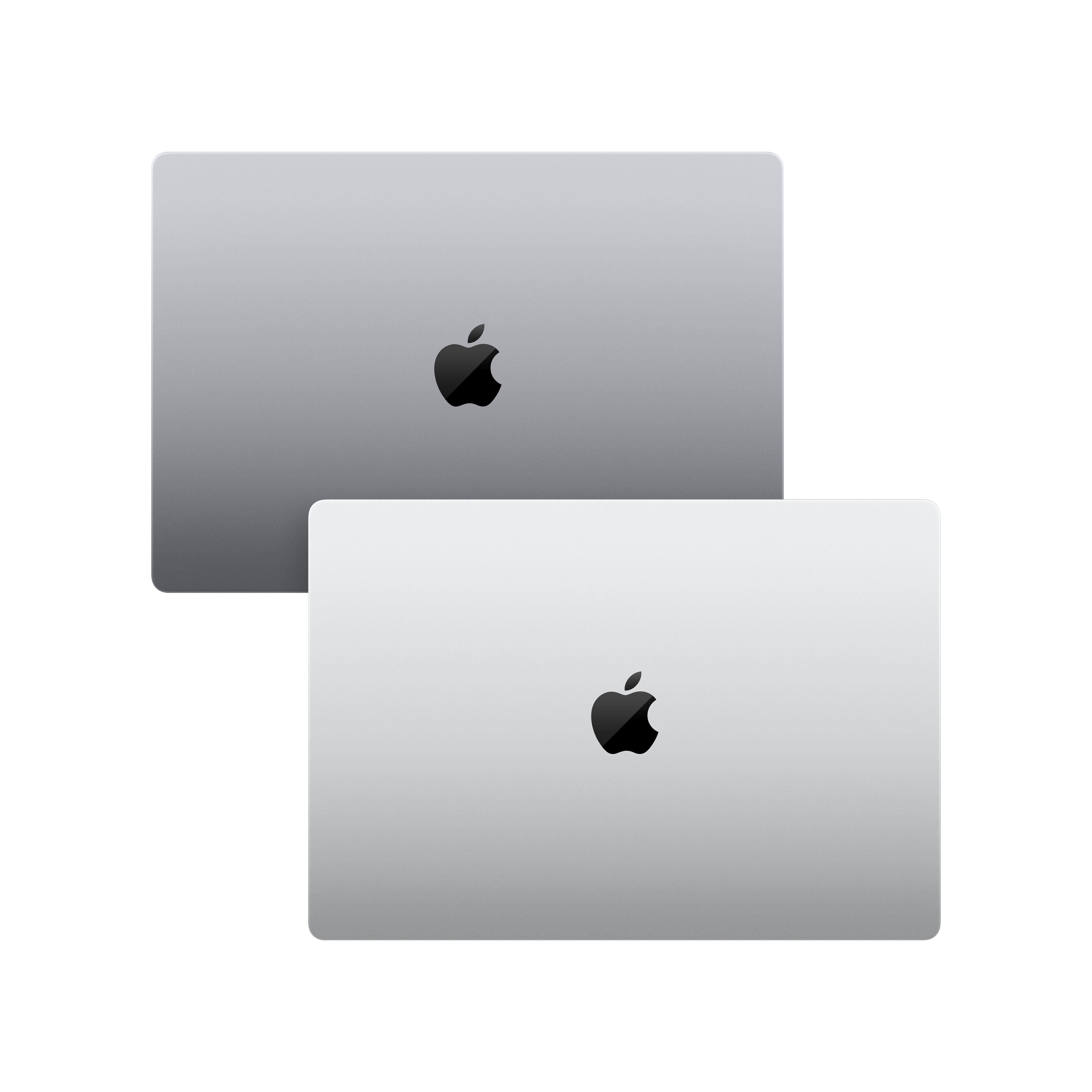 Dos portátiles plateados con el logo de Apple. Ambos portátiles están cerrados. Uno está encima del otro.