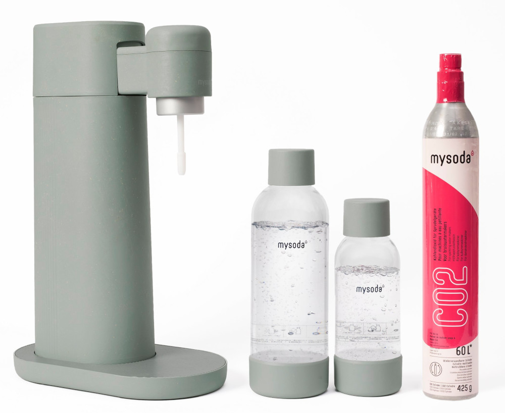 Soda maker, two bottles, and a CO2 cylinder. Green and pink colors.