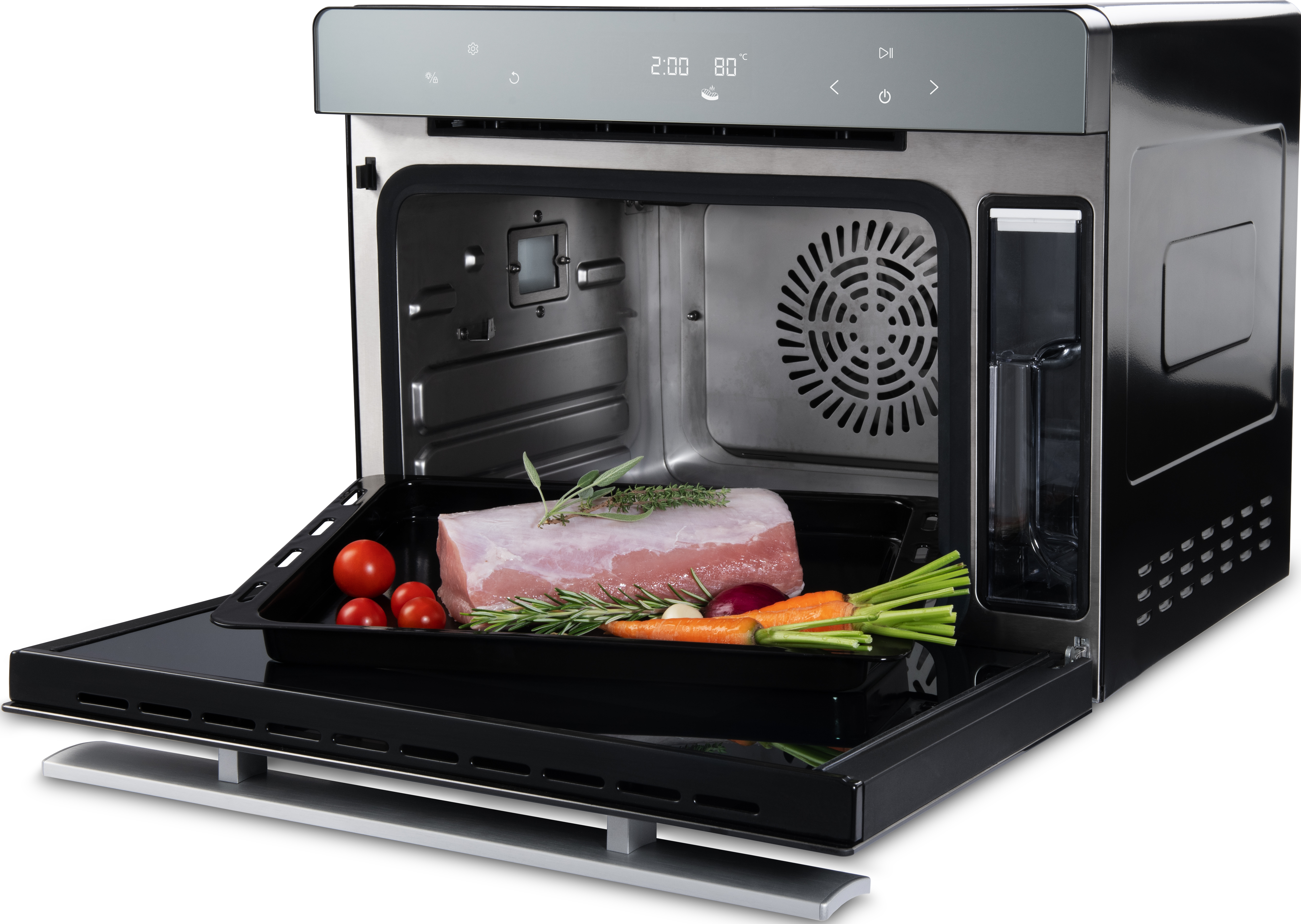 Ein moderner Backofen mit geöffneter Tür, gefüllt mit Fleisch und Gemüse.