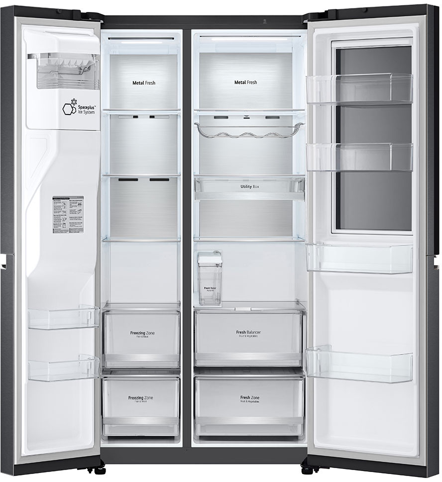 Réfrigérateur ouvert avec étagères, tiroirs et compartiments de rangement. Finition métallique à l'intérieur. Portes ouvertes.