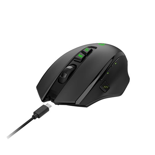 Black gaming mouse with buttons and a cord. A charger is plugged in.