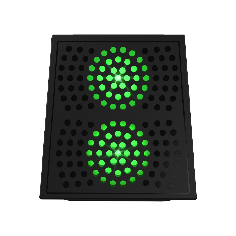 Zwart apparaat met twee cirkels van groene lichten. Geperforeerd oppervlak.