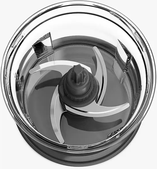 Un bol transparent de robot culinaire avec un mécanisme à trois lames à l'intérieur.