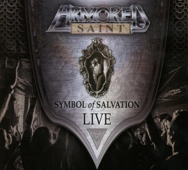 Albumcover mit Schilddesign, einem Porträt und den Worten 'Symbol of Salvation Live'.