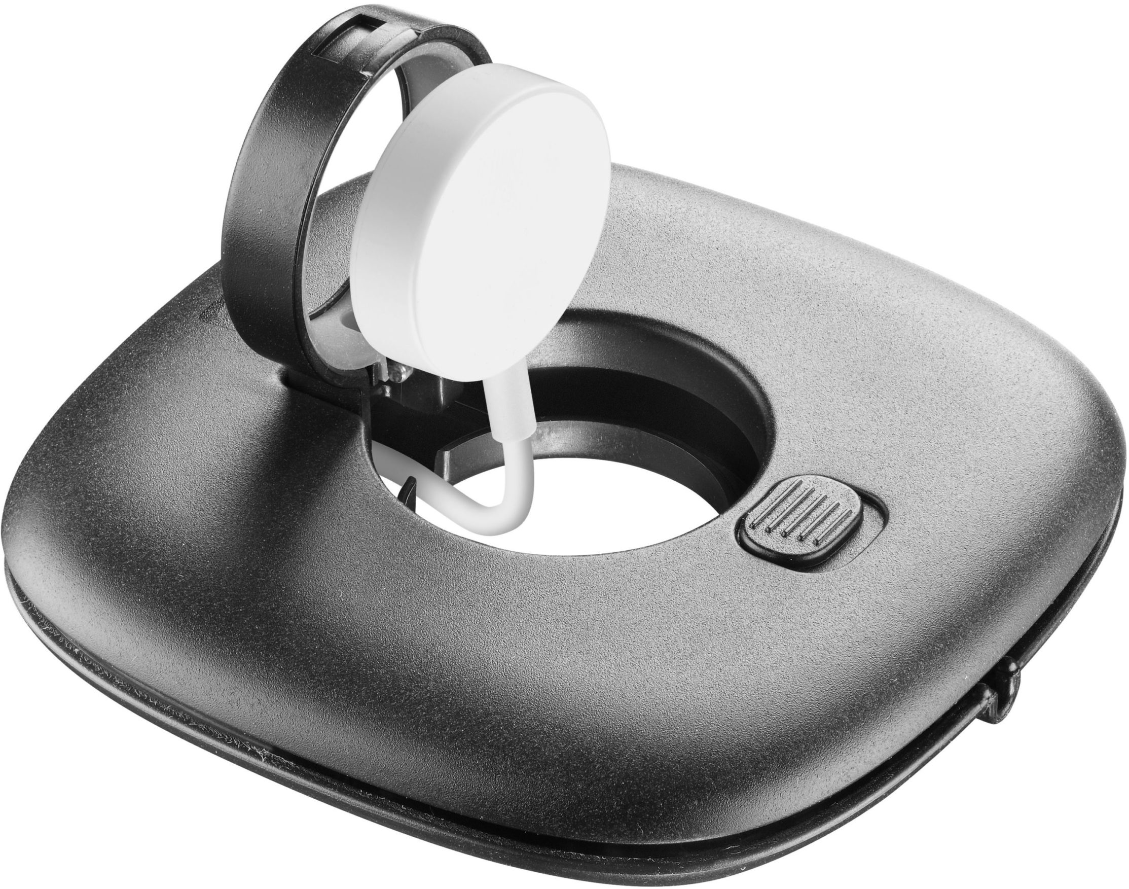 Schwarze Ladestation mit weißem Apple Watch Ladegerät. Der Ständer steht auf einer weißen Oberfläche.