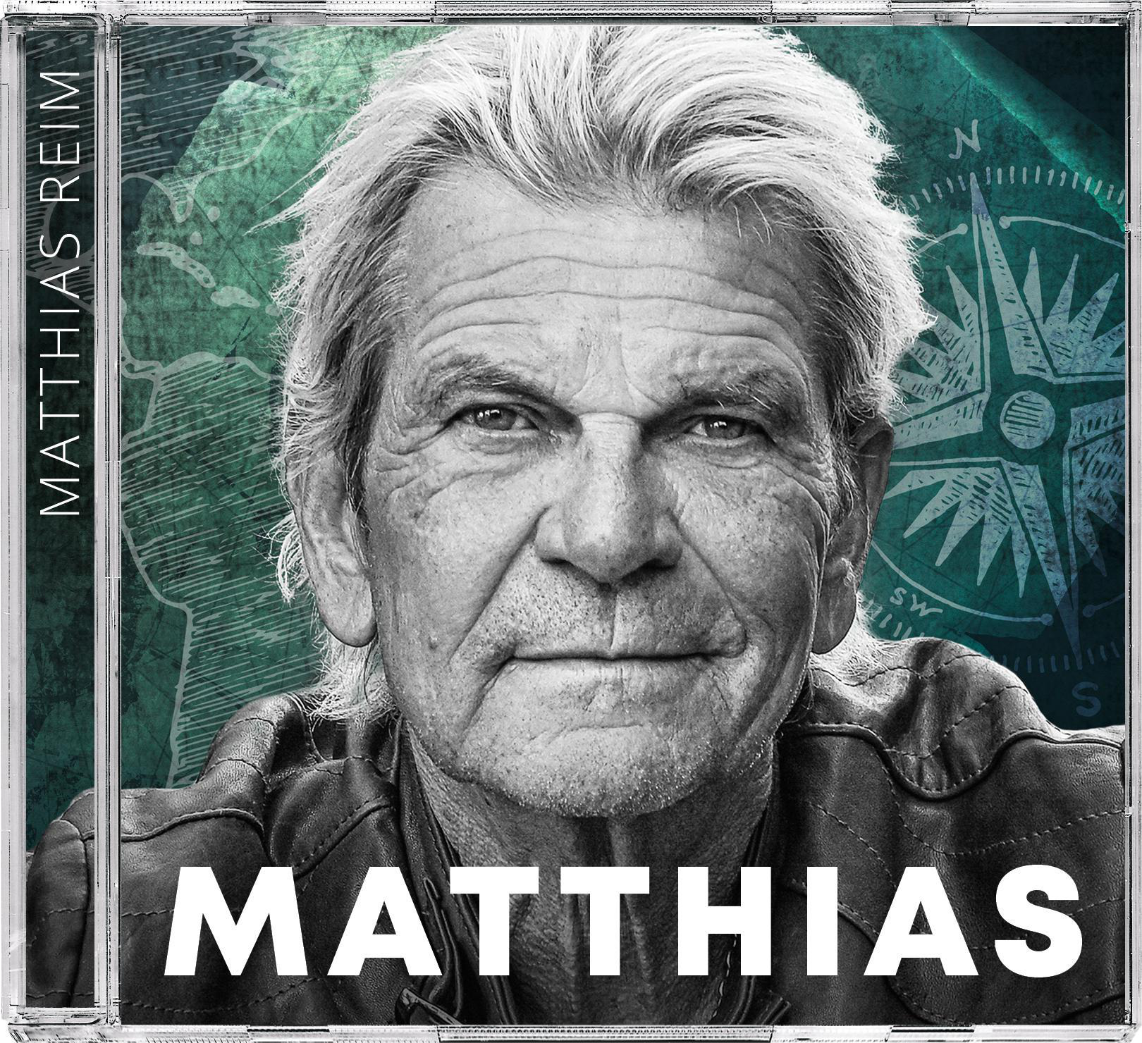 Albumcover: Matthias Reim. Nahaufnahme des Gesichts eines Mannes. Grün-blauer Hintergrund mit Kompass.