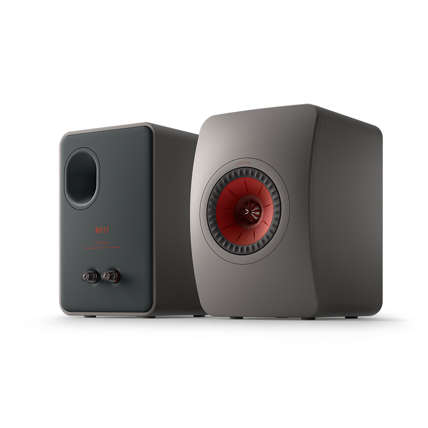 Dos altavoces grises KEF LS50 con conos rojos, sobre un fondo oscuro.