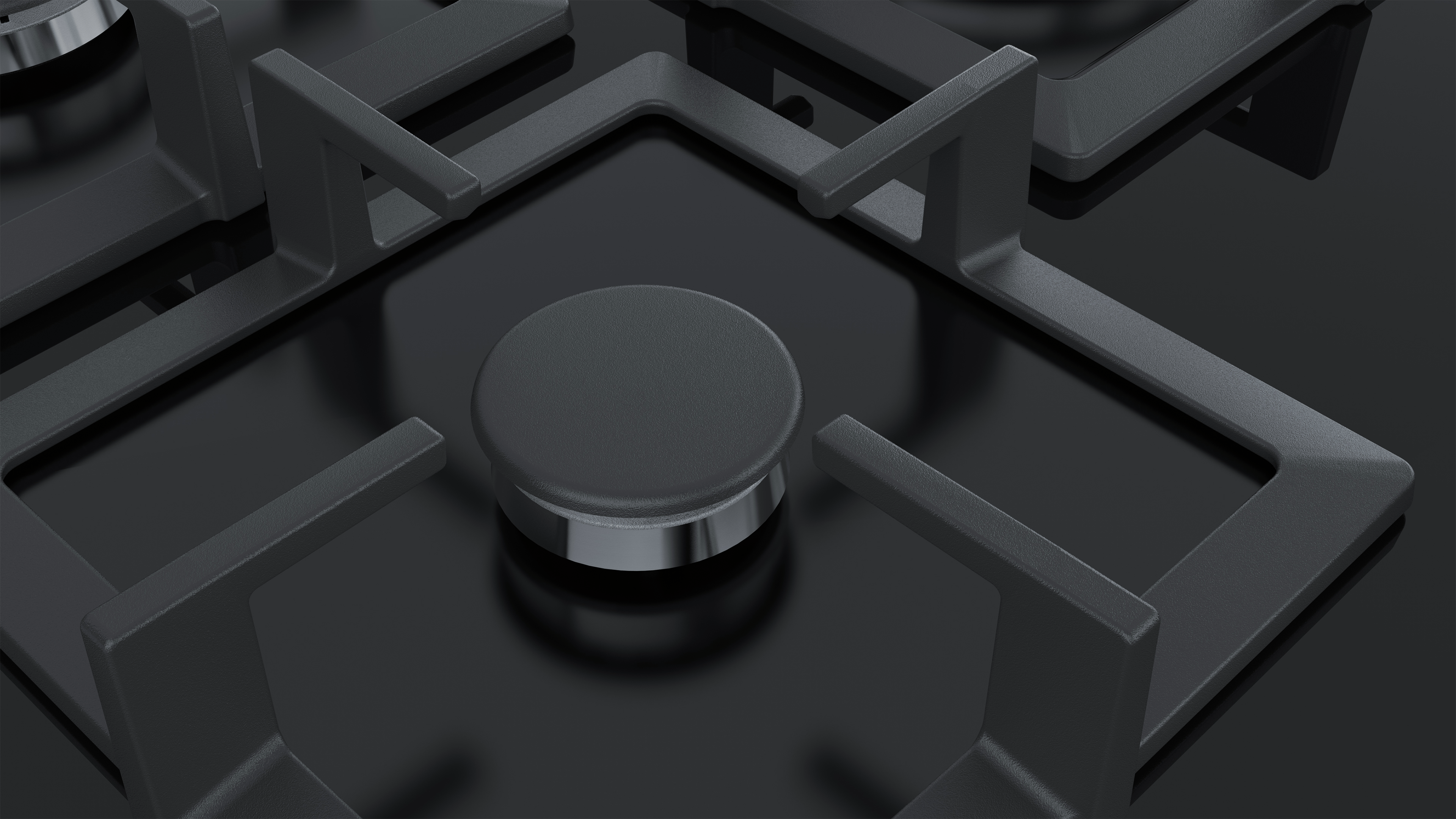 Close-up of black gas burner with metallic grate.