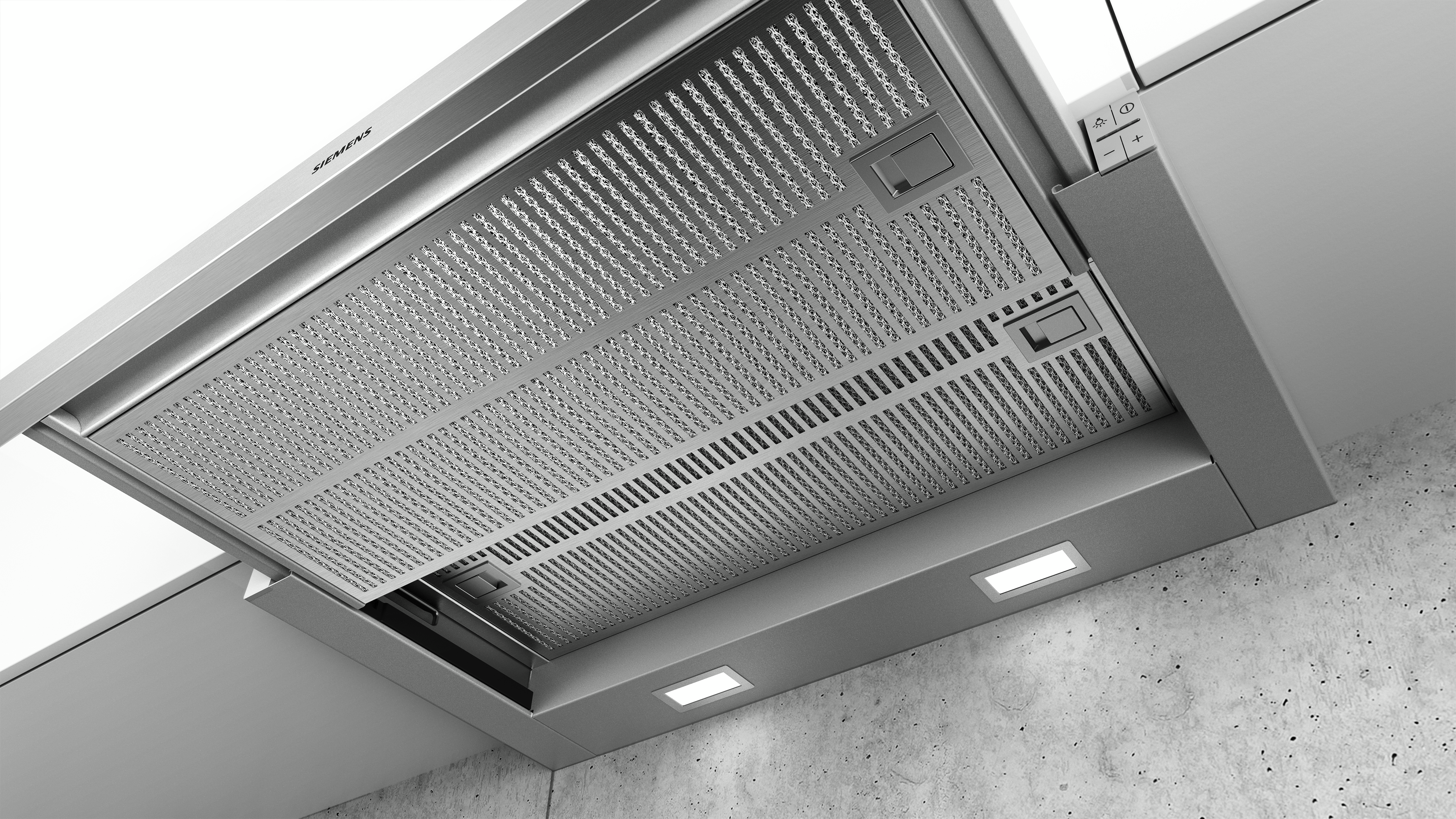A stainless steel range hood with lights and a patterned filter.