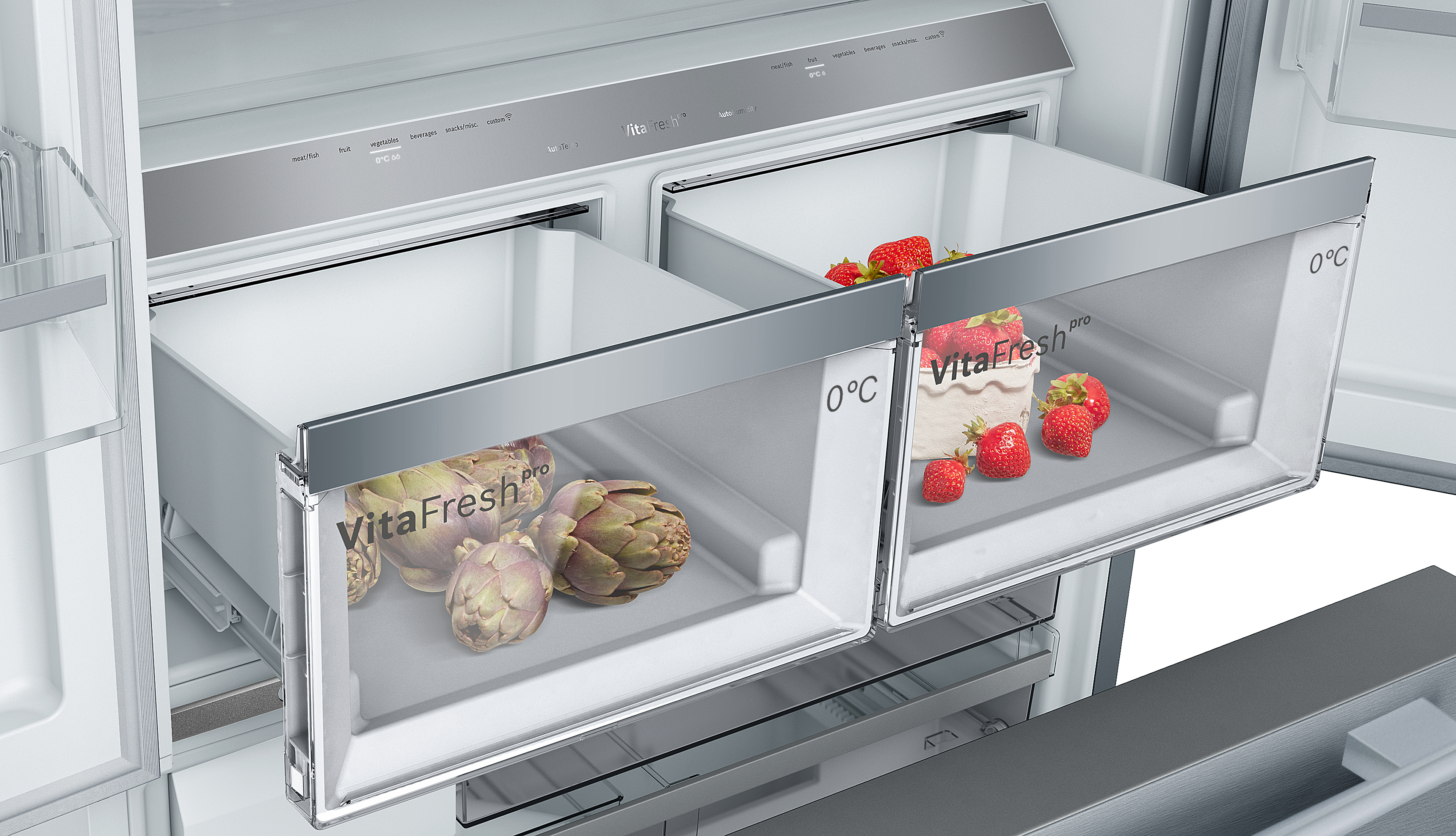 Kühlschubladen mit Artischocken, Erdbeeren und Kuchen, beschriftet mit VitaFresh pro.
