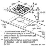Diagram of a gas cooktop with dimensions and measurements in millimeters, and text in French.