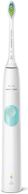 Brosse à dents électrique blanche. Bouton d'alimentation bleu. Tête de brosse verte et bleue. Marque Philips Sonicare.